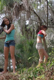 Gia & Layla playing in the woods together getting naked